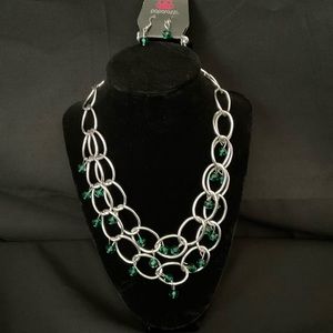 Silver necklace with green beads